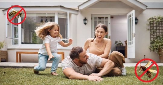 Young family bonding with each other in their garden without risks of bees and hornets