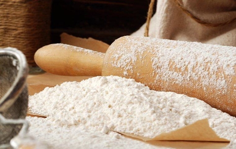 Rolling pin covered in flour.